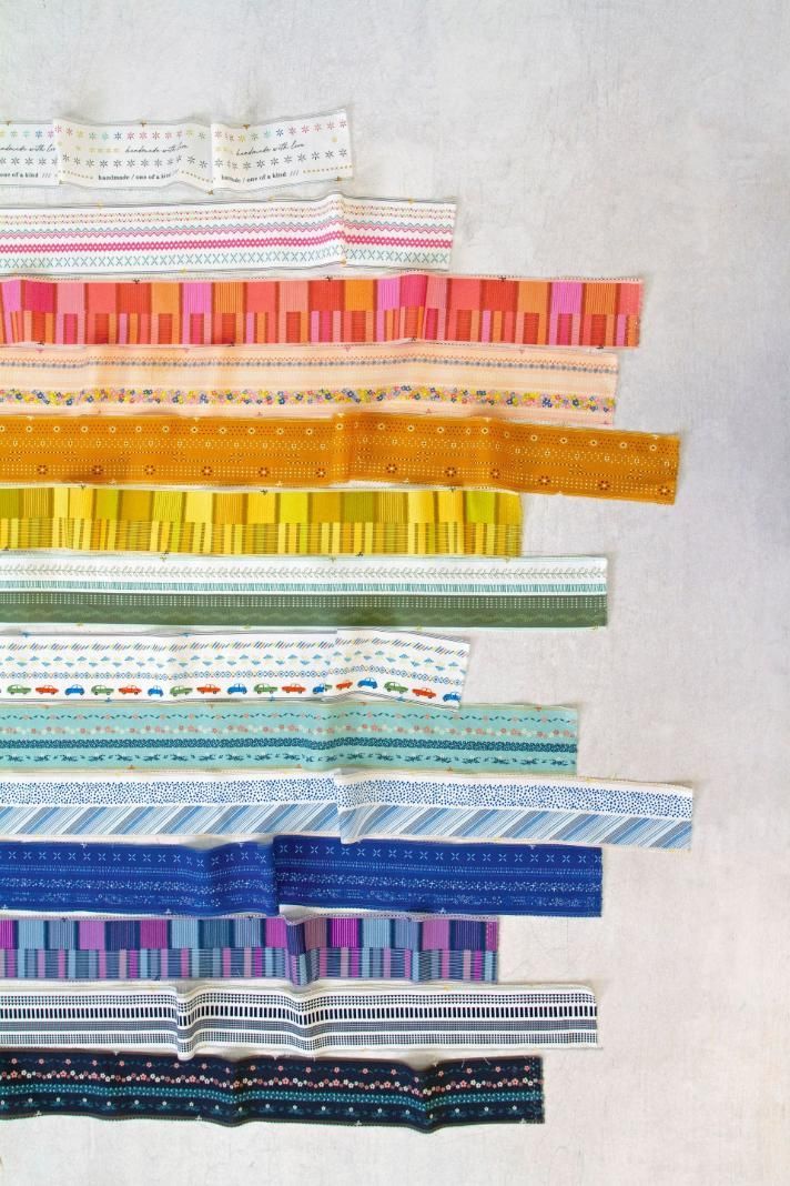 A Stack of Colorful Ribbons on A White Surface — Stitch 2340 In Tamworth, NSW