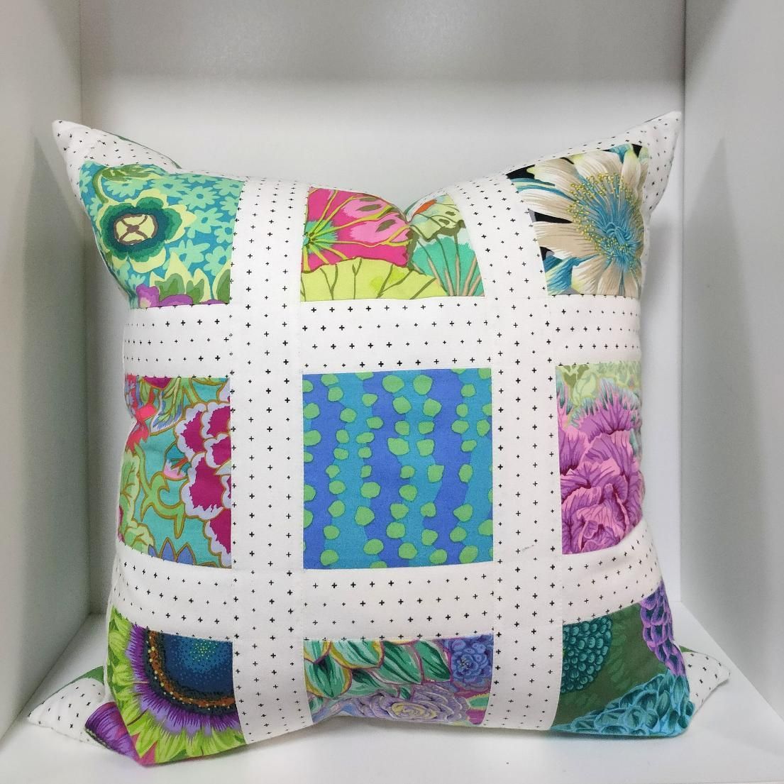 A Colorful Pillow Is Sitting on A White Shelf — Stitch 2340 In Gunnedah, NSW