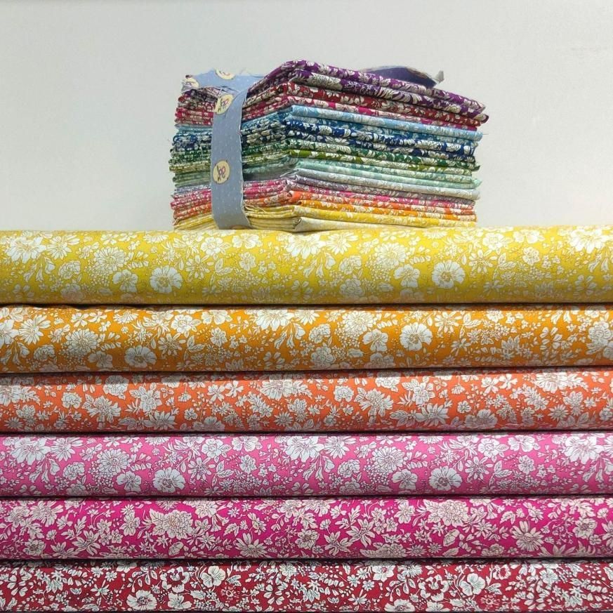 A Stack of Colorful Fabrics with Flowers on Them — Stitch 2340 In Gunnedah, NSW