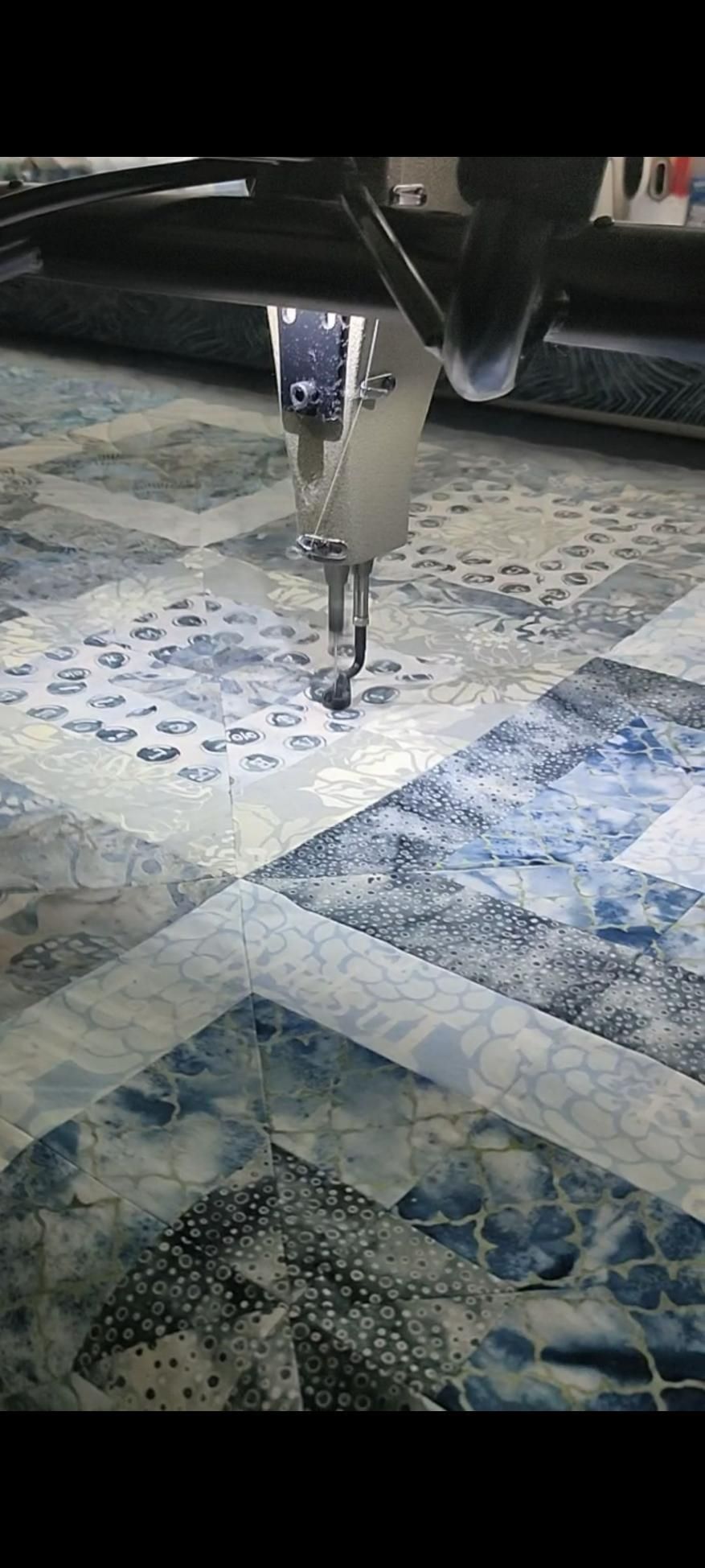 A Machine Is Stitching a Quilt on A Table — Stitch 2340 In Armidale, NSW