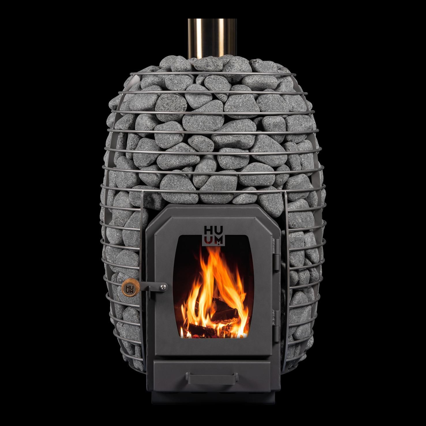 A sauna stove with a cage of rocks, a fire in the door, and a chimney.