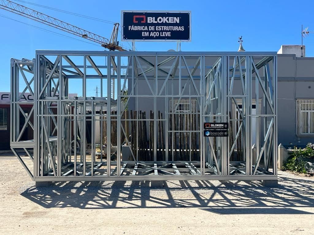 Metal frame of a building under construction with a 