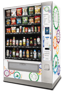 A white vending machine filled with healthier snack options