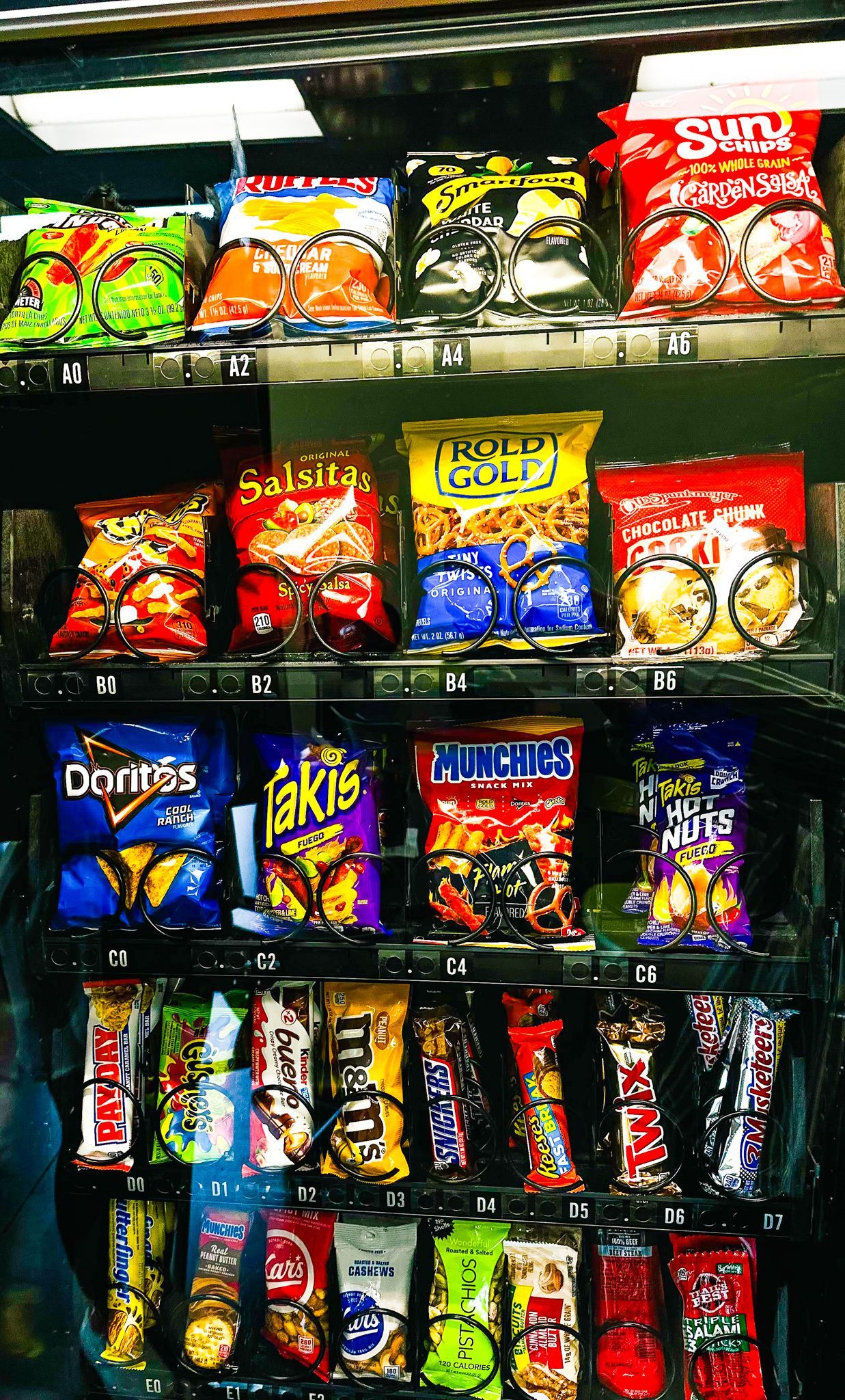 Vending & Markets button – snack machine with chips and candy