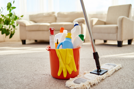 Orange Bucket And Mop In The Living Room