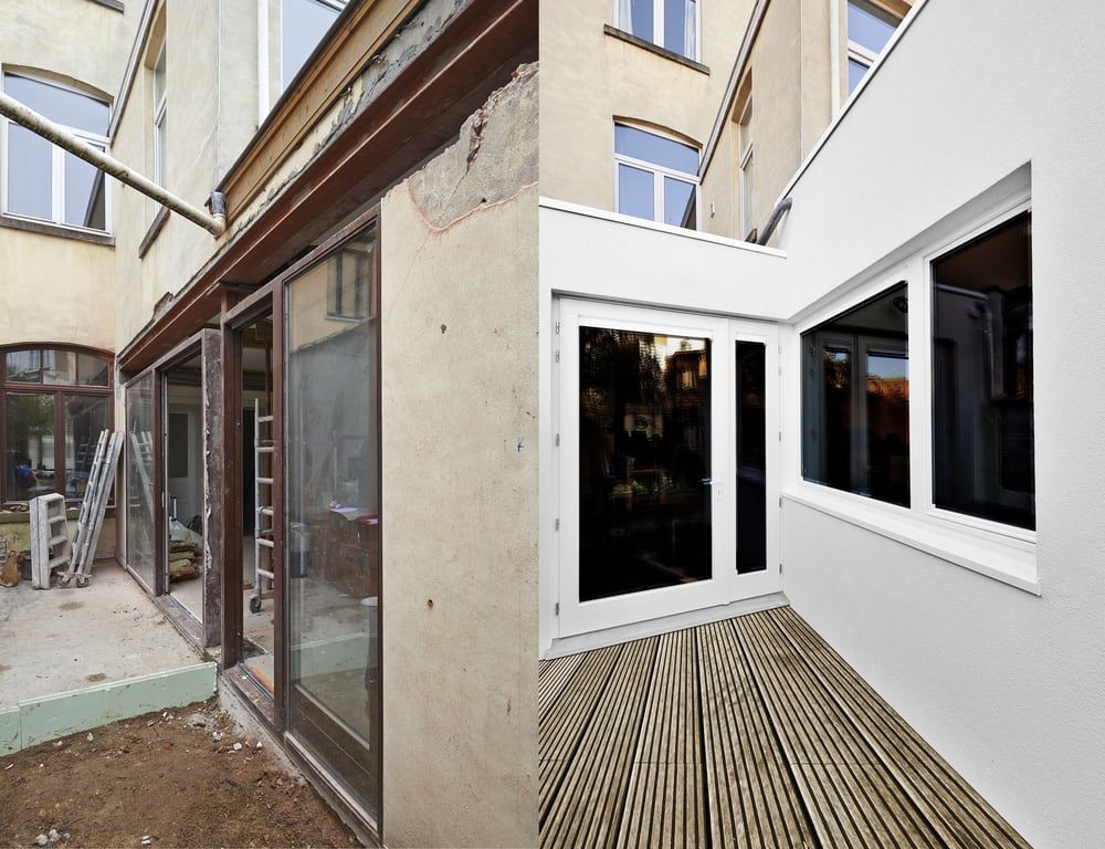 Before and After Renovation of a Building's Outdoor Area With New Windows and Wooden Deck — Clearspan Builders In Royalla, NSW