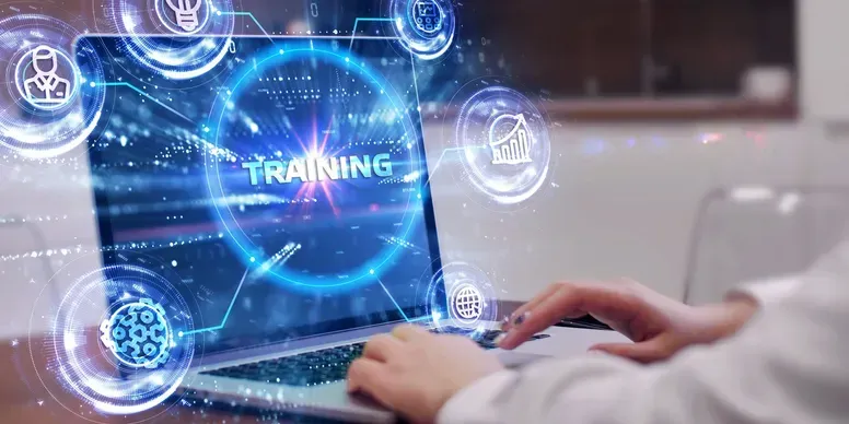 Person using a laptop with a glowing