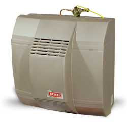 Beige Bryant HVAC unit with a yellow hose and valve on top