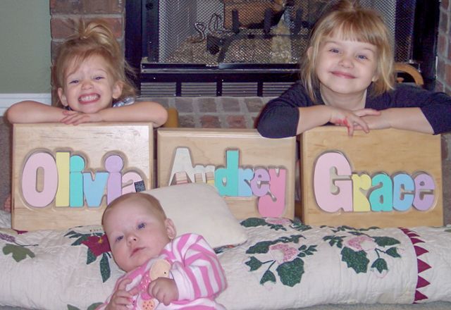 A group of multiple puzzle stools with three sisters. 