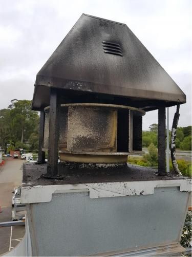 Smoky Rooftop Canopy Vent — Central Coast Commercial Kitchen Cleaning in Tuggerah, NSW