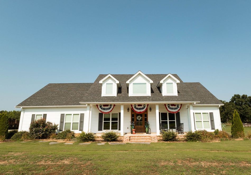 A newly built white, custom home.