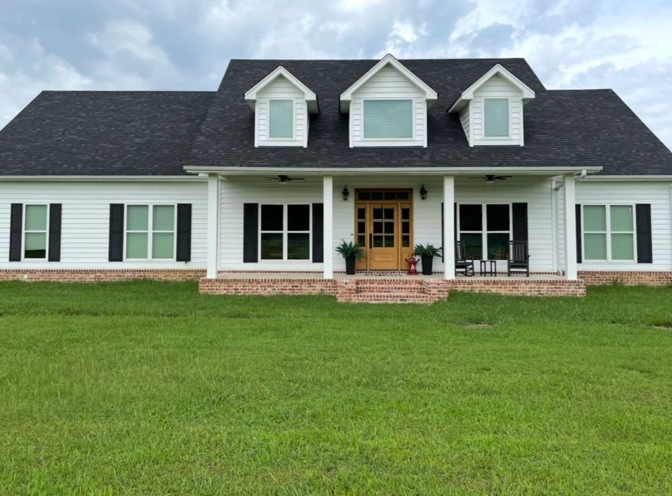 A newly built white, custom home.