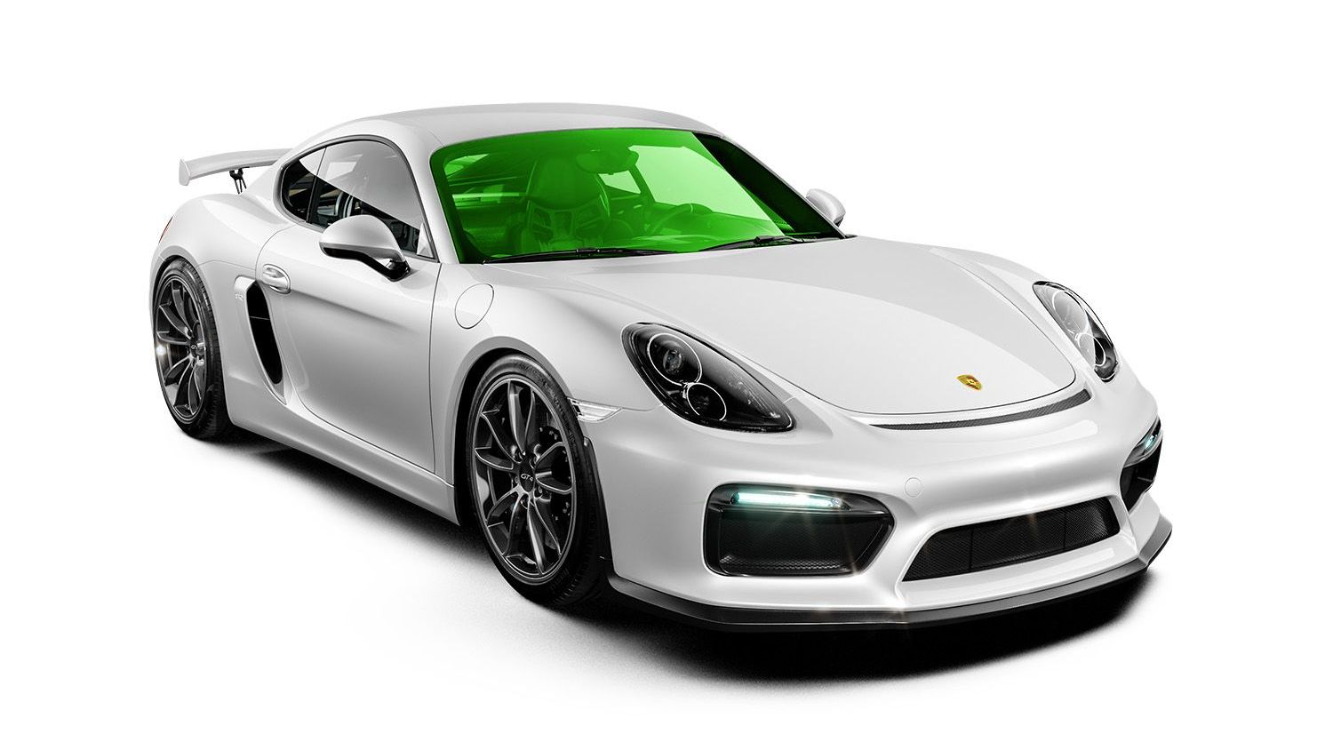 White Porsche sports car with black wheels and green windshield.