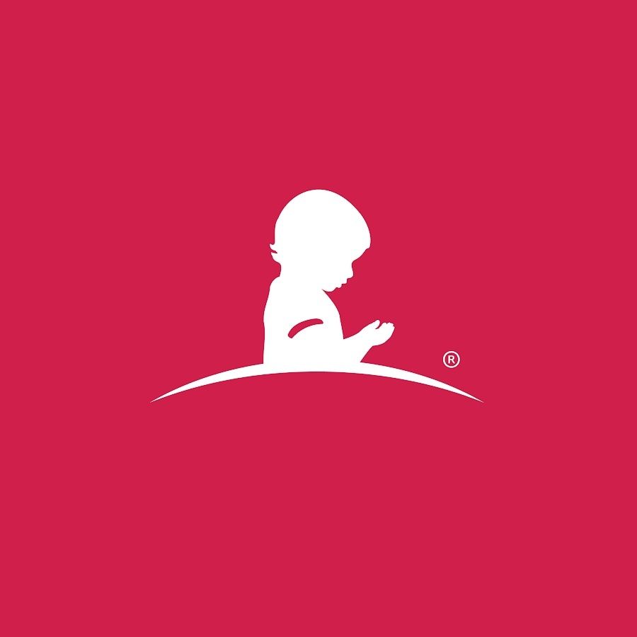 White silhouette of a child, head bowed, hands clasped, on a red background.