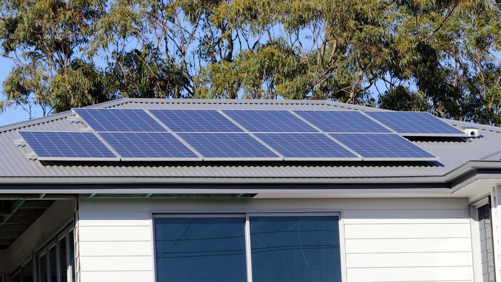 A House with A Lot of Solar Panels Installed on The Roof — Solar Blessing in Stanthorpe, QLD