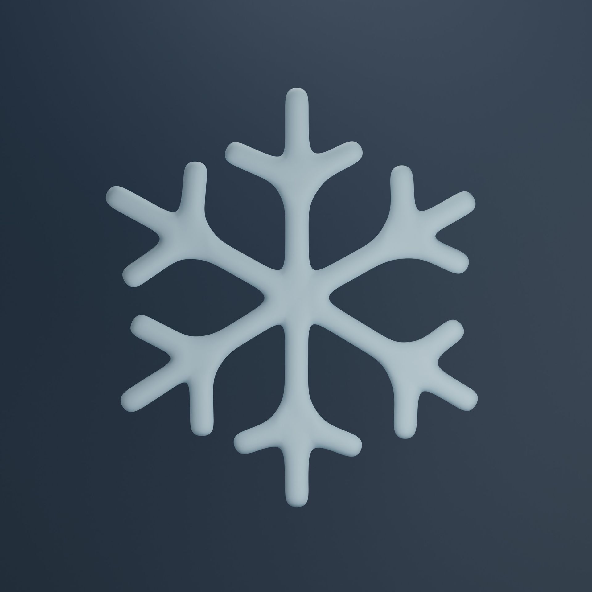 A white snowflake on a dark blue background