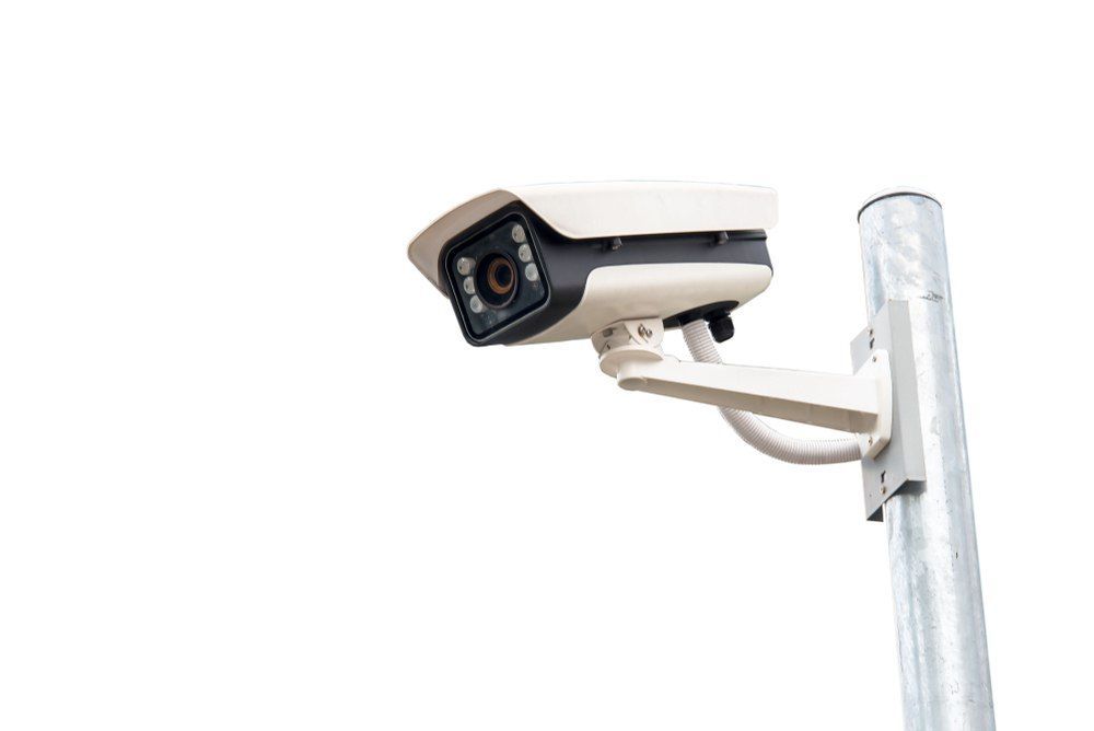 Security Camera Mounted on a Silver Pole — X-Mod Security In Landsborough, QLD