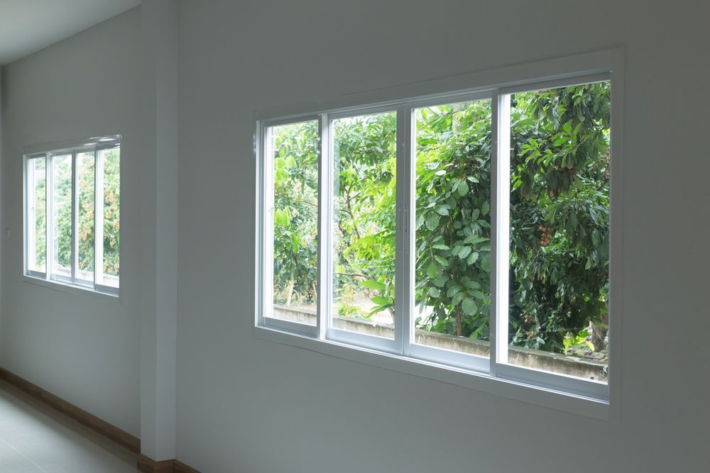 Two White-framed Windows on a White Wall — Israel Jones Painting in Idalia, QLD