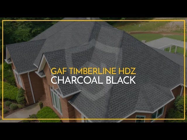 GAF Timberline HDZ charcoal black shingles on a residential roof, viewed from above