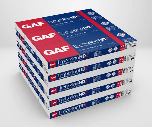 Stack of GAF Timberline HD roofing shingle bundles, blue and white packaging