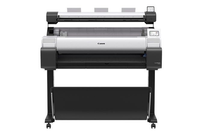 Canon large-format printer, white and black, on a black stand.
