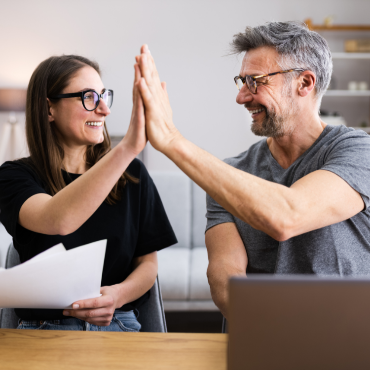 happy couple getting rid of debt