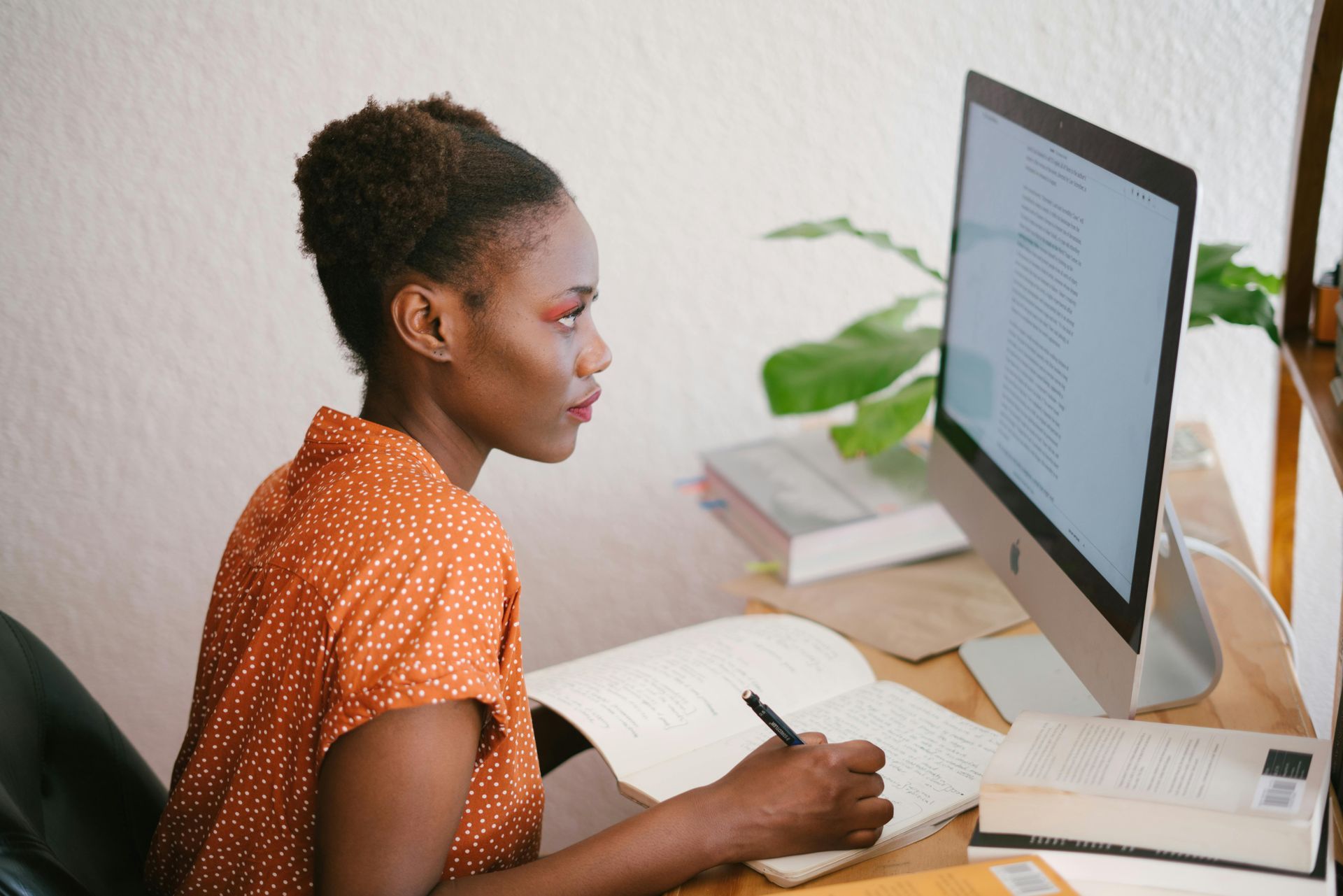 A young girl studying.