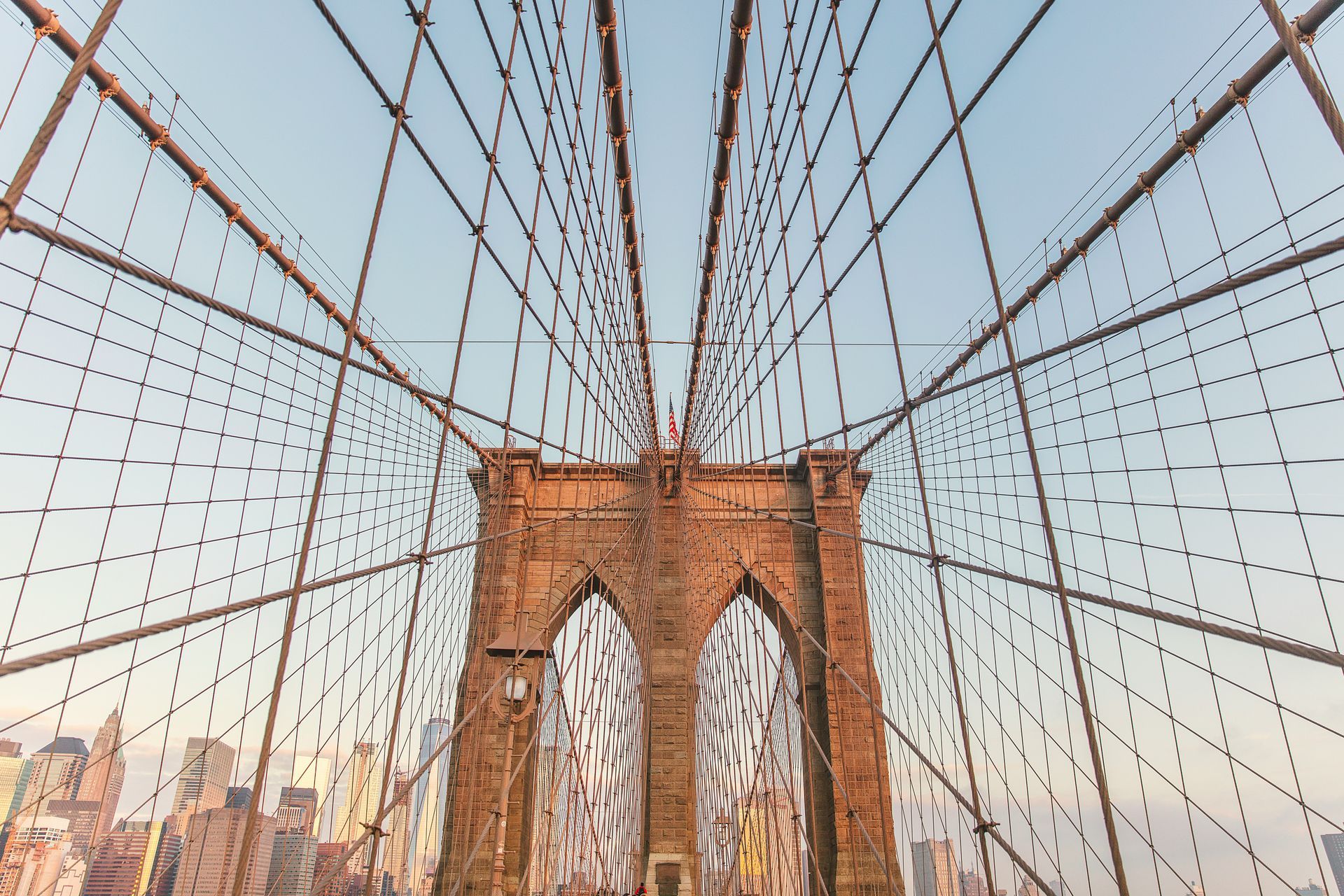 Looking up at the brooklyn bridge in new york city.