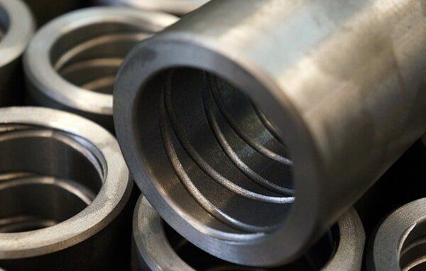 A Close Up of a Bunch of Metal Pipes and Fittings — AWE Engineering in South Lismore, NSW