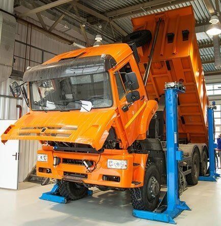 A Close Up of a Truck Parked in a Garage With a Crane — AWE Engineering in South Lismore, NSW