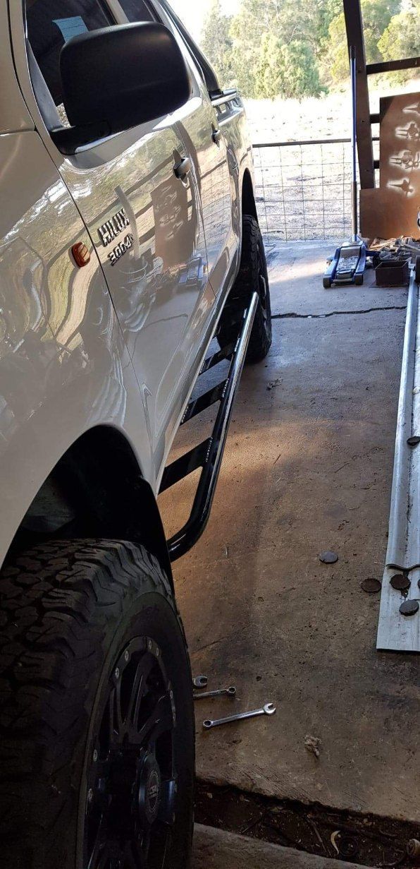 A Vehicle's Side With Aftermarket Running Boards — AWE Engineering in South Lismore, NSW