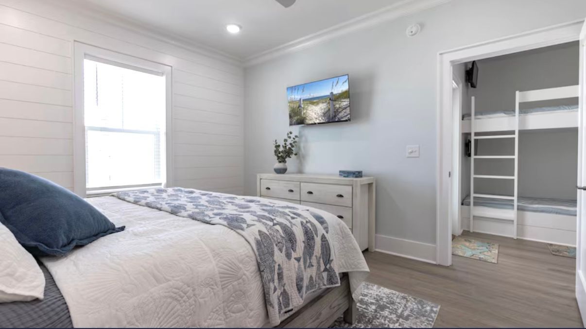 Twin size bunks built into hallway, outside of upstairs king size bedroom at Rest Ashore in Gulf Shores, Alabama