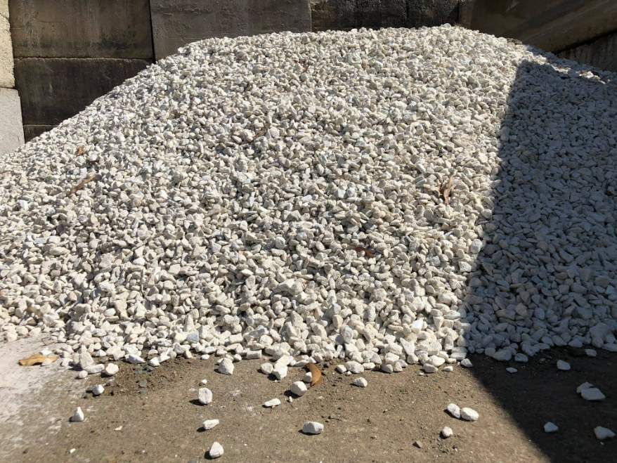 A Pile of White Gravel is Sitting on the Ground — HKL Landscape Supplies in Coolongoolook, NSW