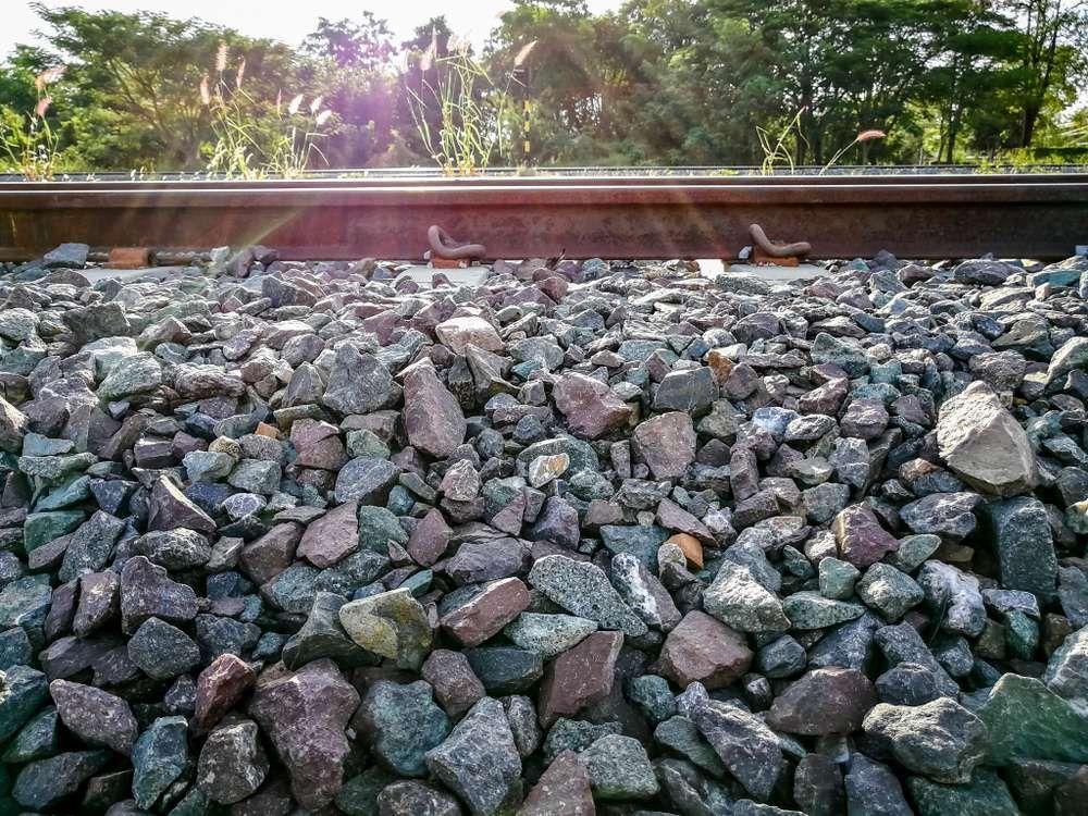 A Pile Of Rocks On The Side Of A Train Track — HKL Landscape Supplies in Taree South, NSW