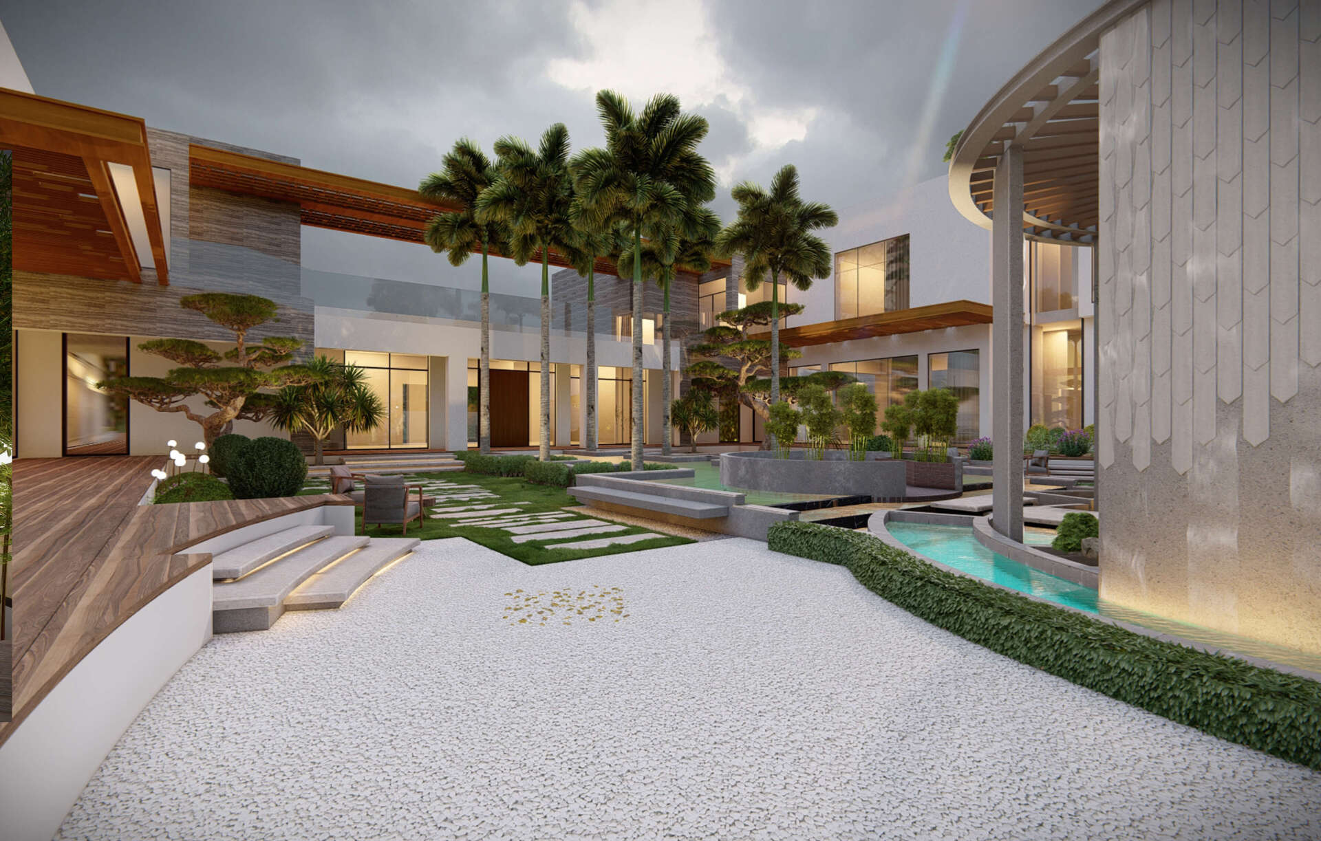 Luxurious modern home with outdoor courtyard featuring white gravel and landscaping.