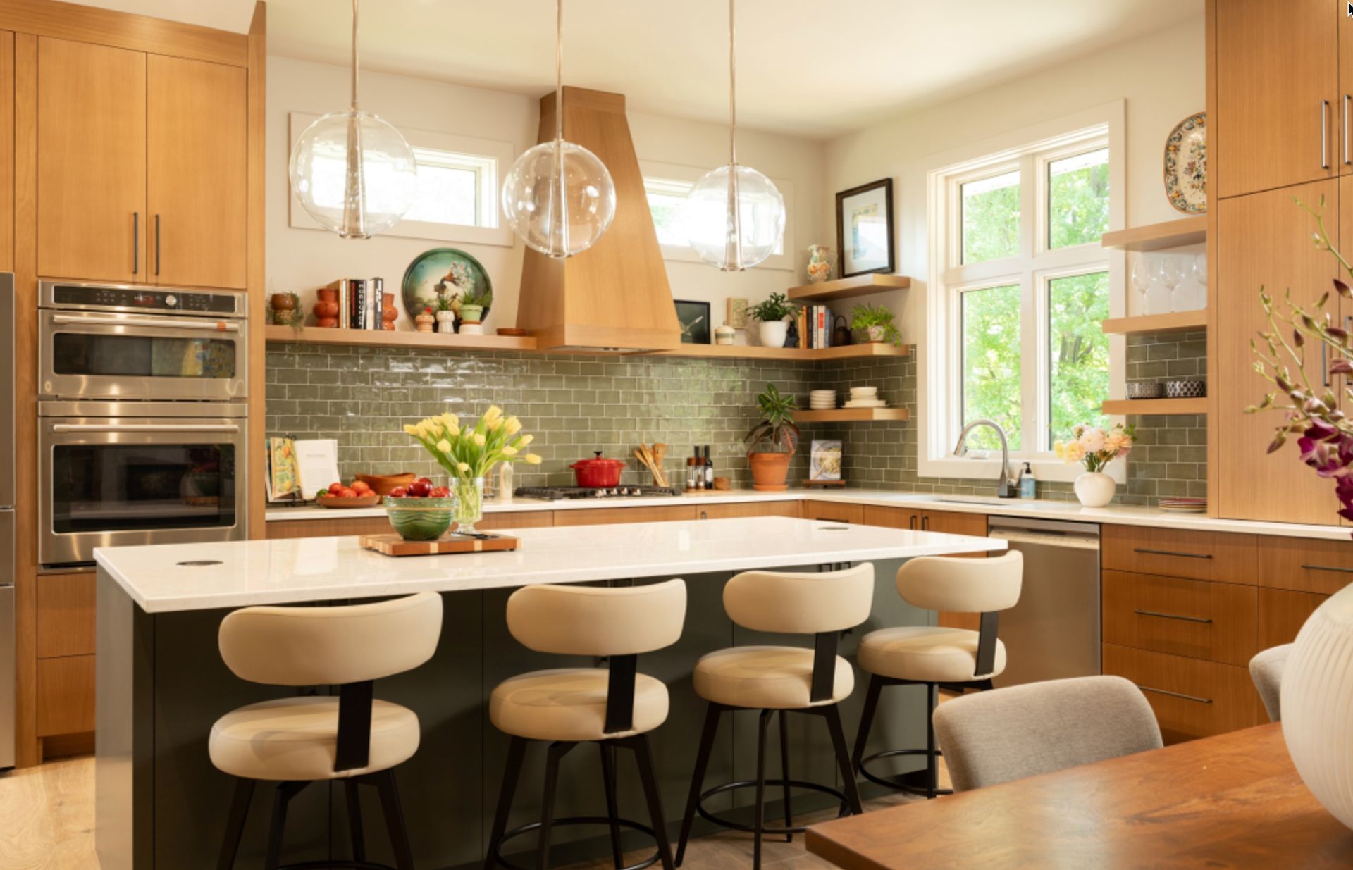 Modern custom kitchen remodel with wood cabinetry, large island, pendant lighting, and open shelving