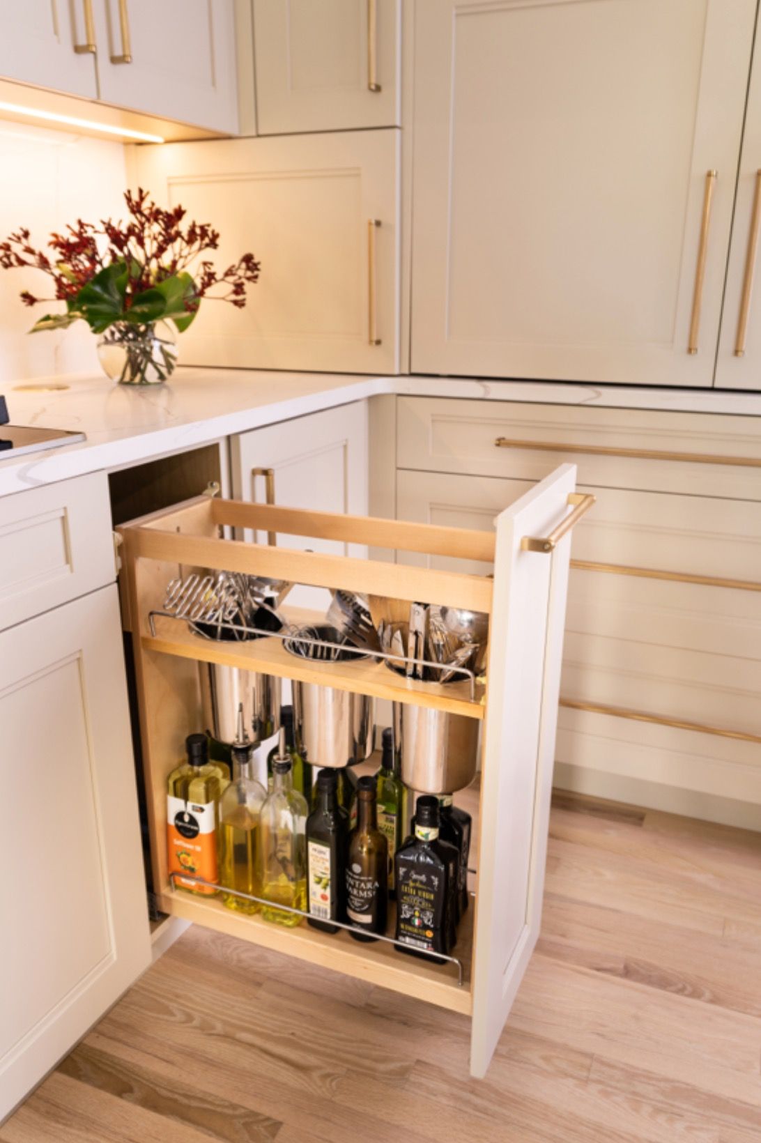 Custom kitchen cabinet pull-out storage featuring premium cabinetry design and organization solution