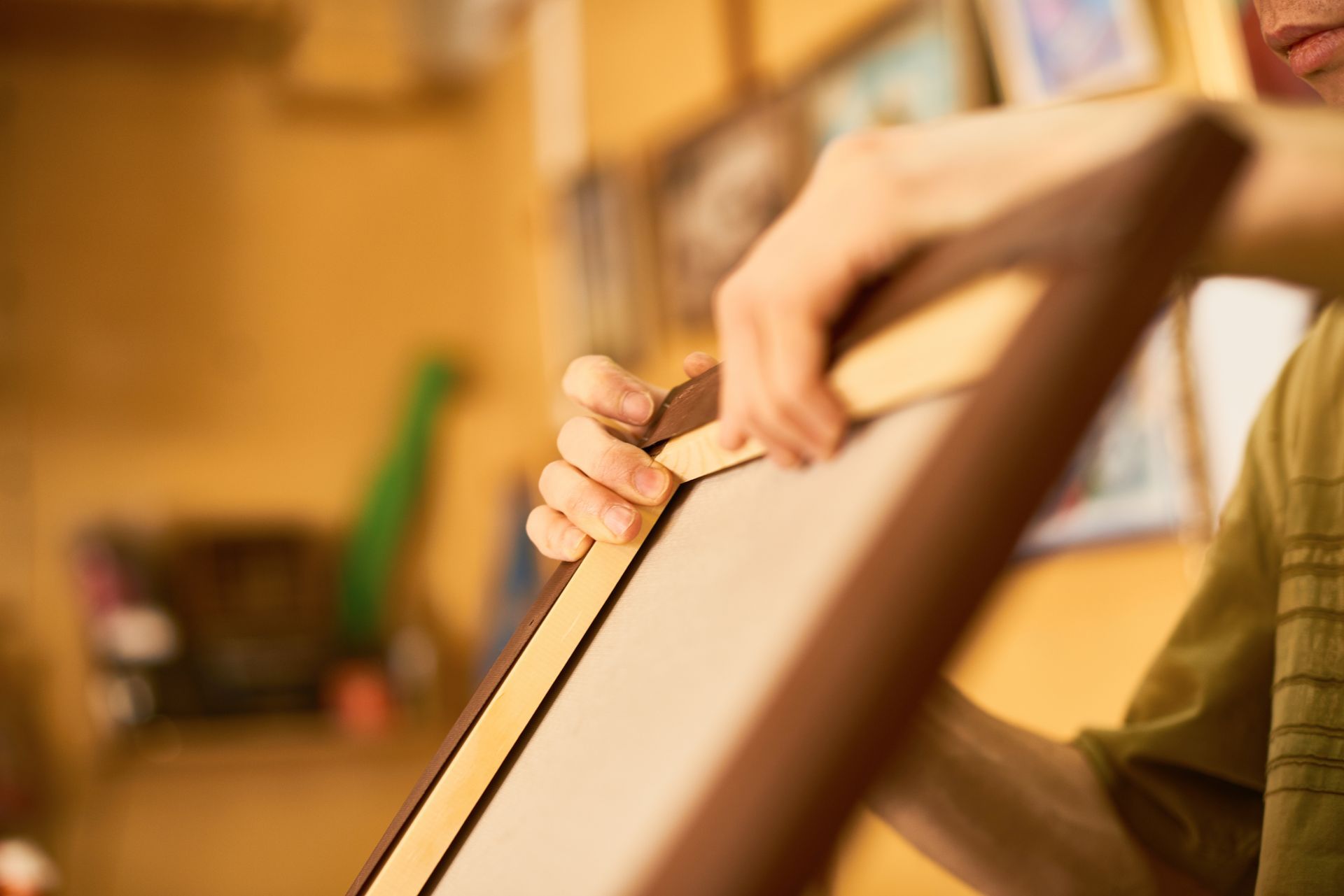 Artwork and canvas custom framing at Caruso Custom Framing