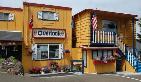 A yellow building with the word overlook on it