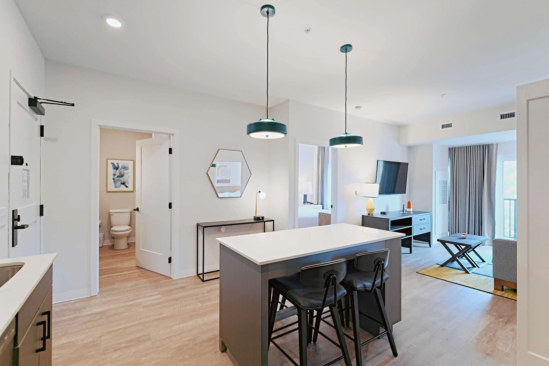 A kitchen with a large island in the middle of the room.
