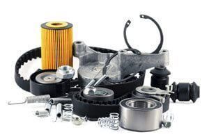A bunch of car parts on a white background.
