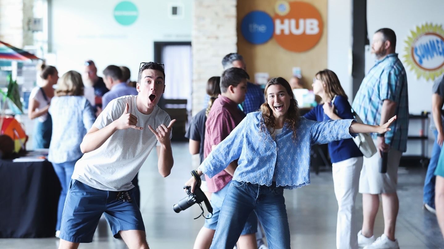 image of smiling young adults looking at the camera