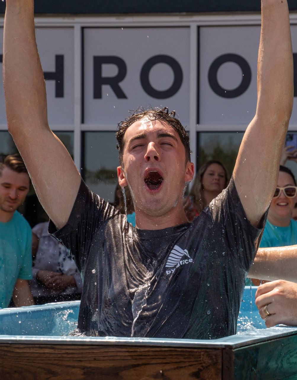 smiling young adult male who just got baptized