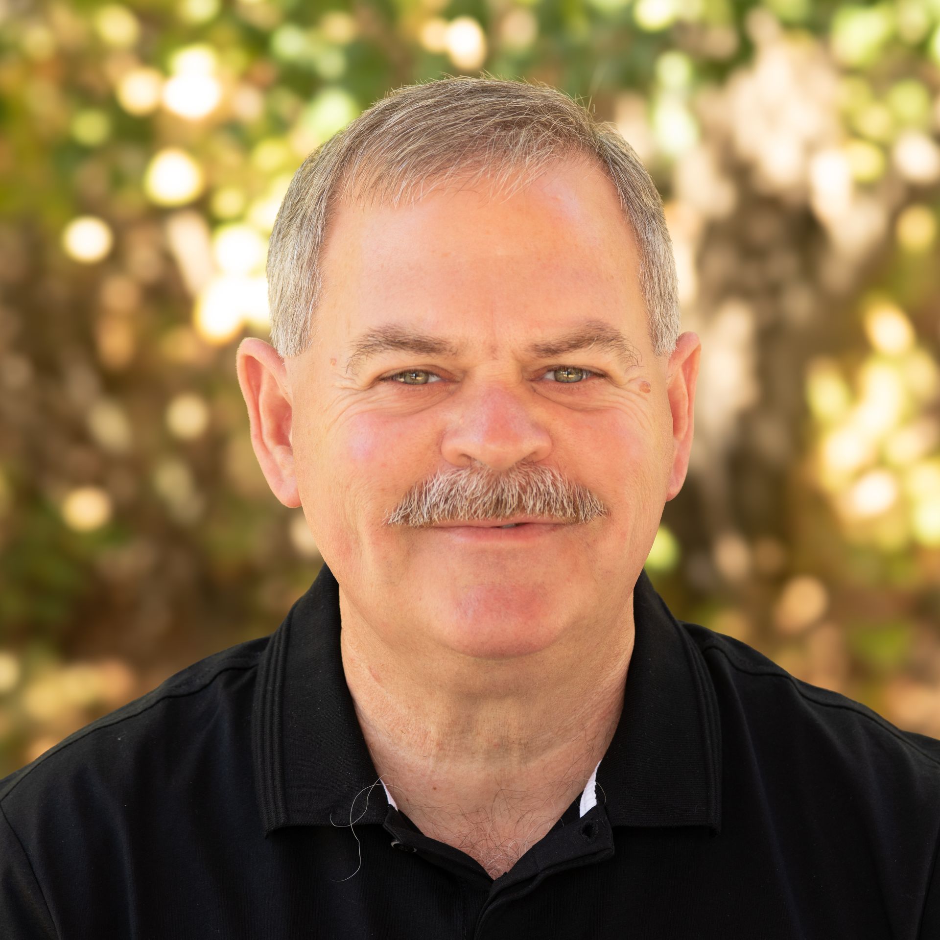 photo of smiling adult male