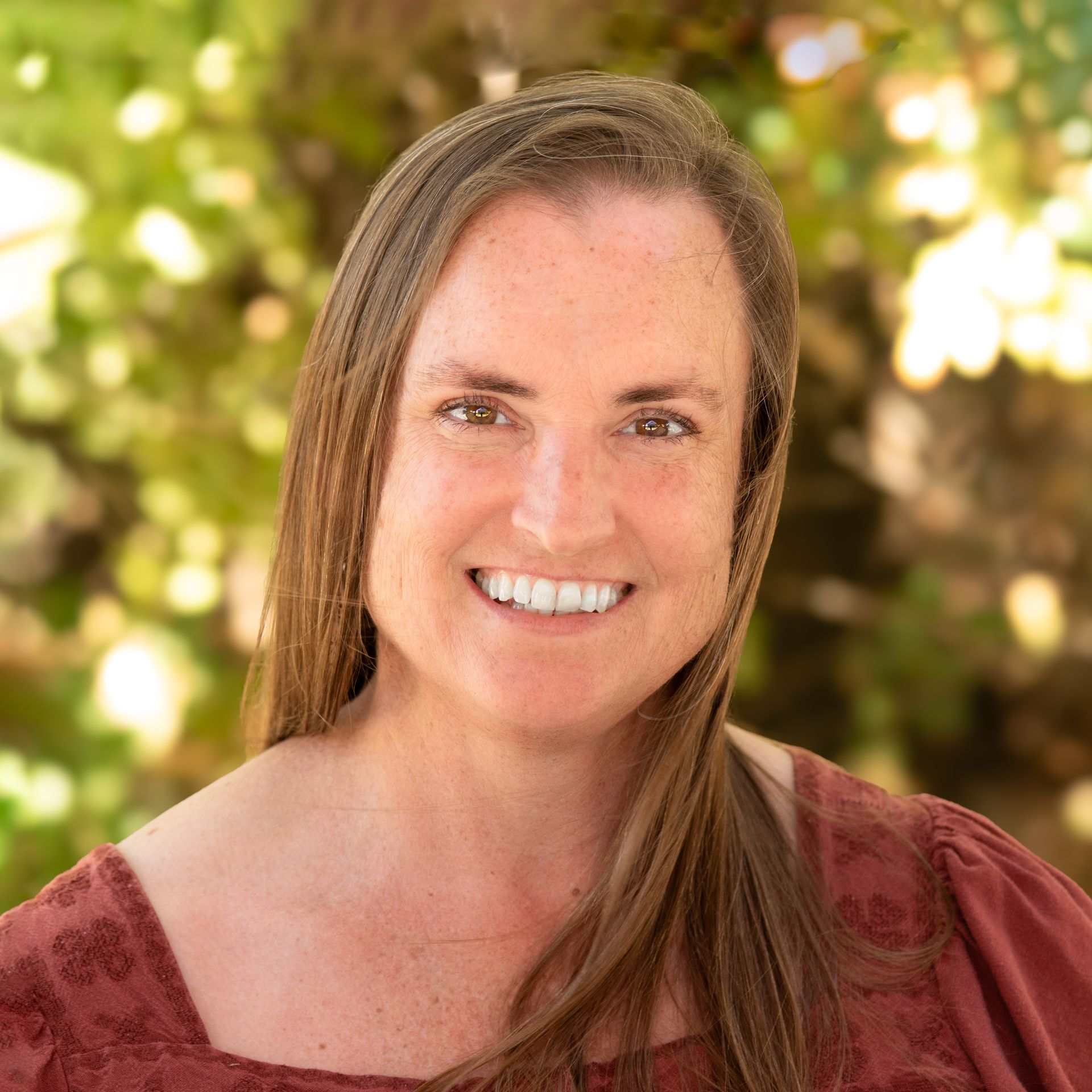 photo of smiling adult female
