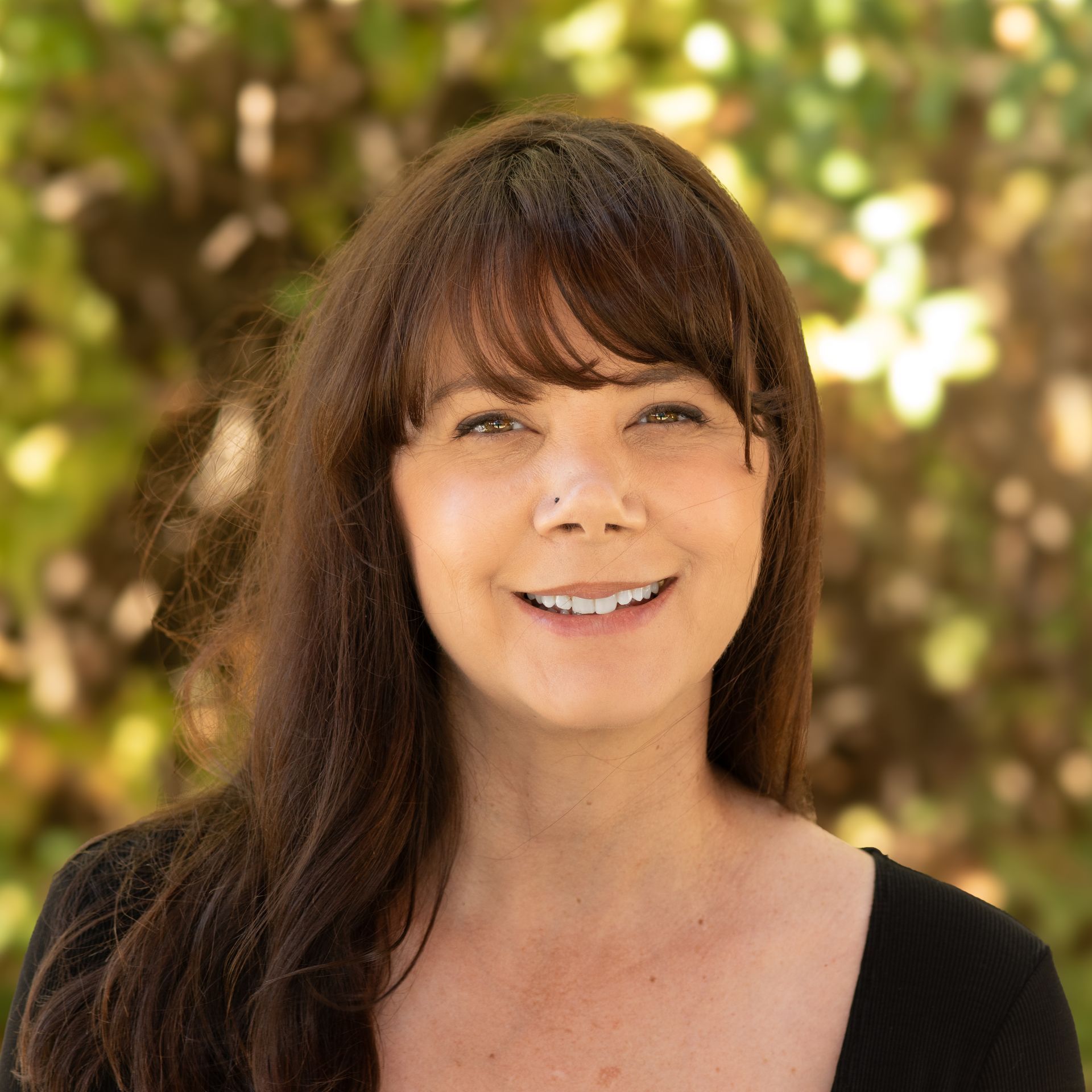 photo of smiling adult female