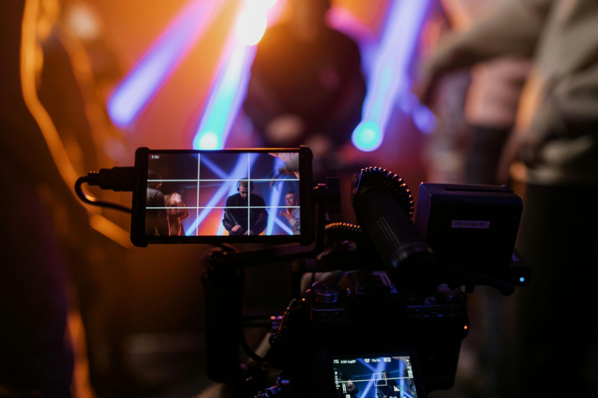 image from behind a video camera, showing what is being filmed through the screen