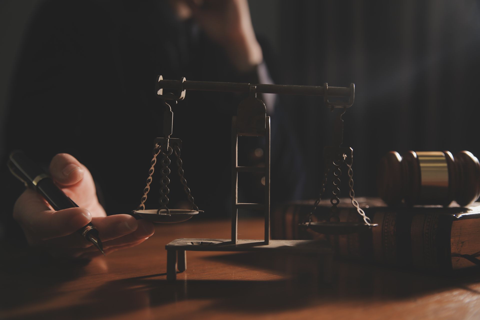 Scales of justice on a desk representing civil litigation legal support in Chicago, Illinois.