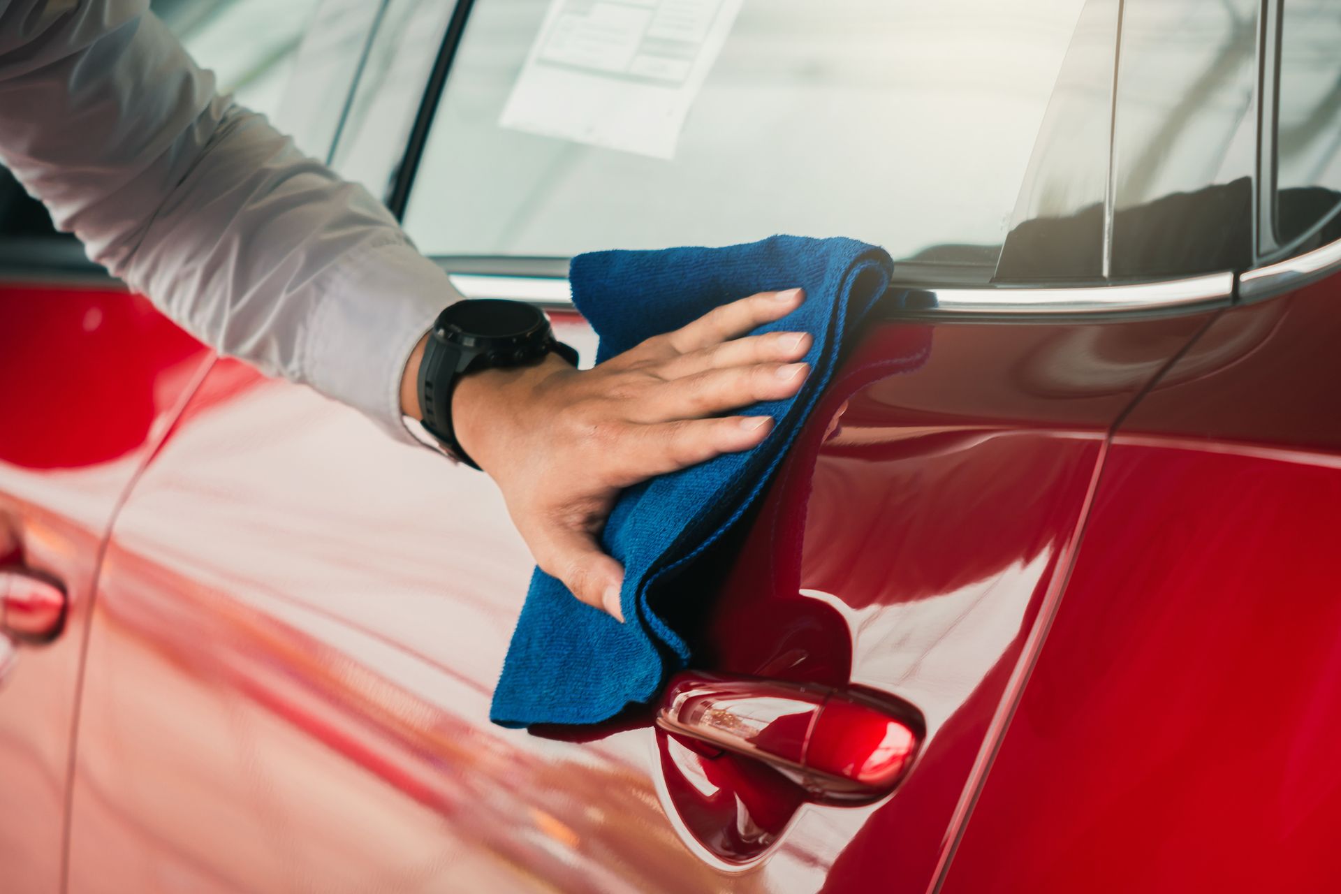 Wiping Red Car — Kailua, HI — Fine Shine Hawaii Wiping Red Car — Kailua, HI — Fine Shine Hawaii
