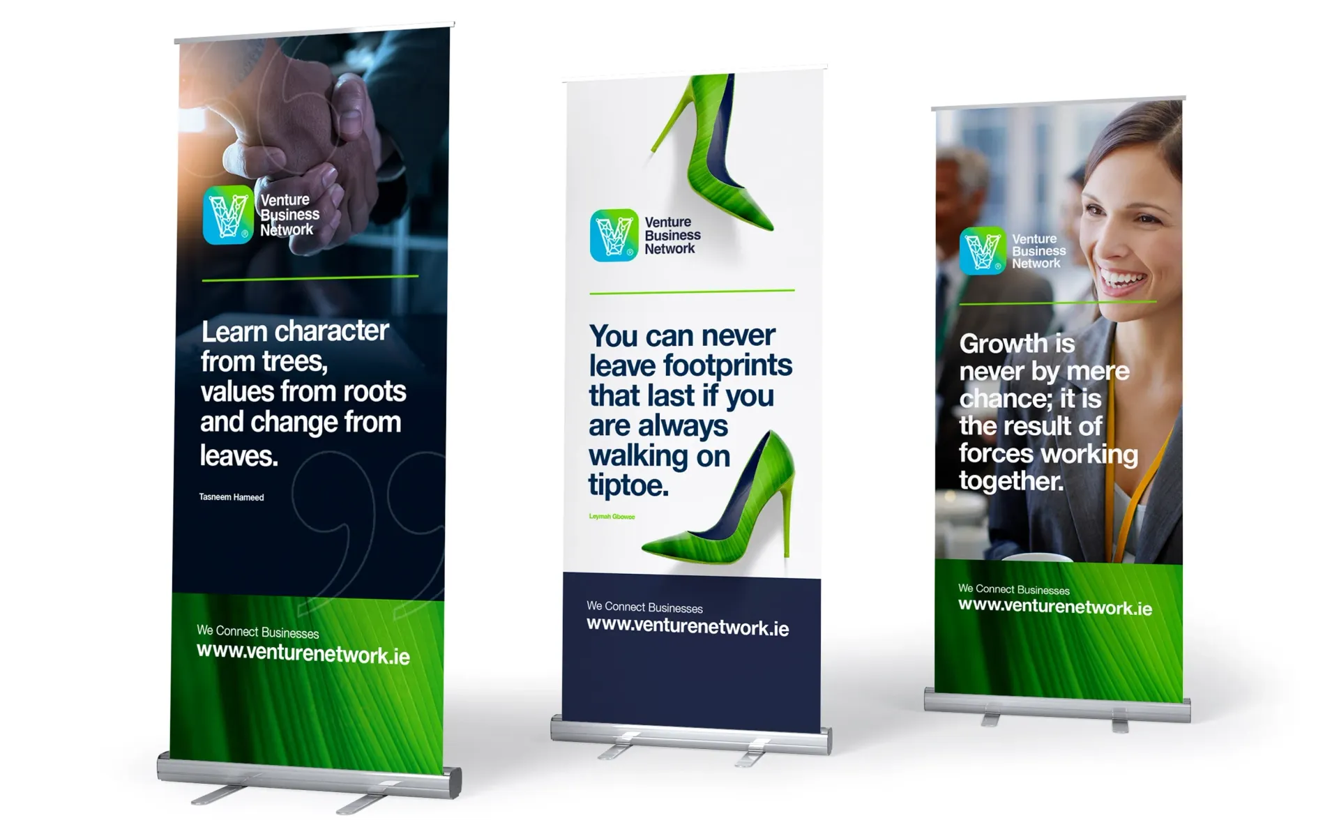 Three retractable banners with green and blue color scheme, featuring text and images related to business or growth.